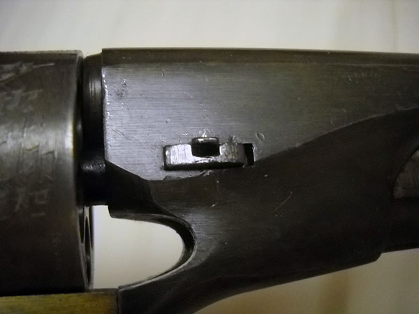 detail, Colt 1851 right side and disassembly key spring catch